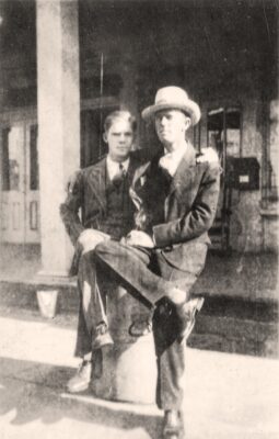 An old photo with two men sitting very close to each other - queer coded? Maybe a queer ancestor?