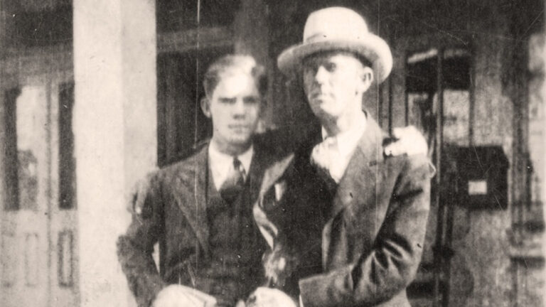 Two men seated together taken in the early 20th century