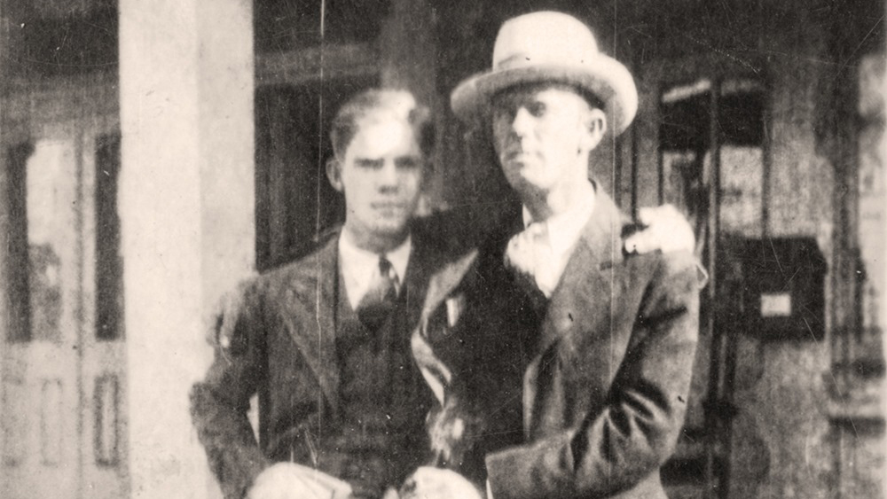 Two men seated together taken in the early 20th century